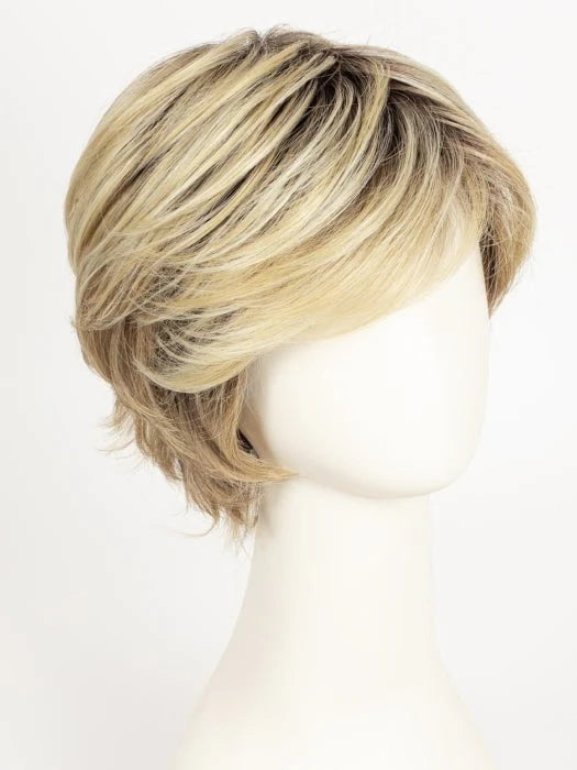 short layered synthetic wig in ash blonde on mannequin with side swept bangs and textured layers