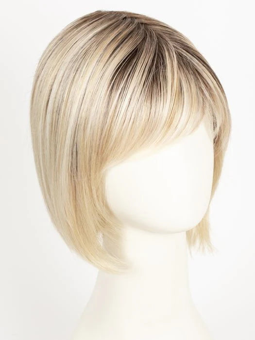 Short layered blonde synthetic wig Ellen Wille with natural dark roots and soft side bangs on mannequin head