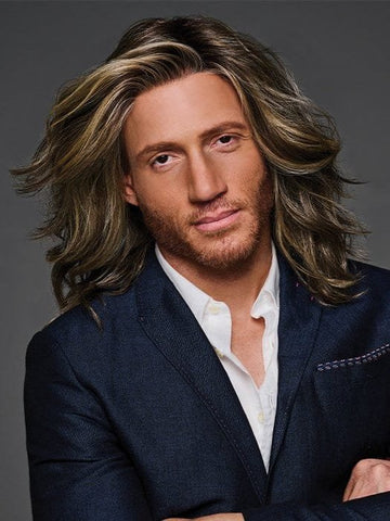 HairUWear Admirable HIM wig for men. man wearing long layered wavy brown wig with blonde highlights and natural hairline