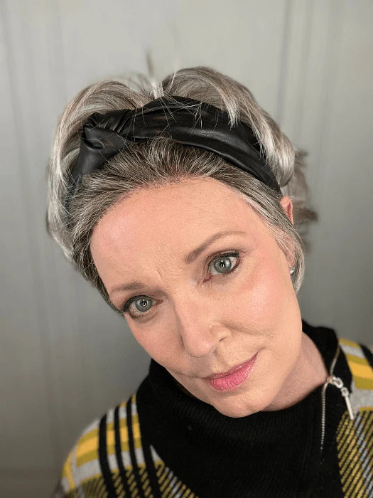 Close up of woman wearing Ellen Wille Raise wig short silver gray style with black headband and natural makeup