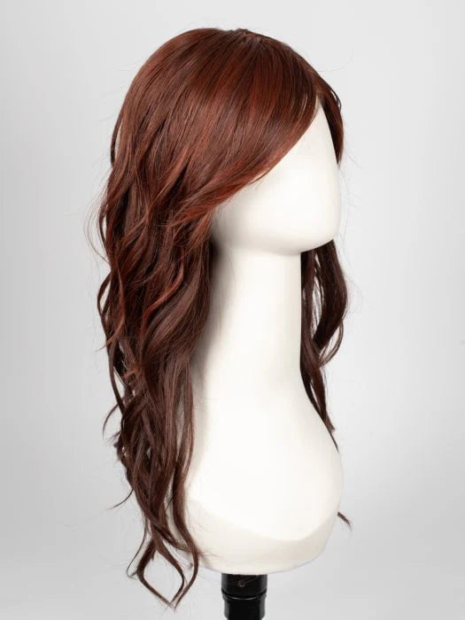 long wavy brown wig for women displayed on a white mannequin head with side swept bangs and layered mid length waves
