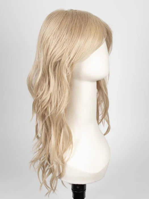 long wavy brown wig for women shown on mannequin in light ash blonde long layered waves with side bangs